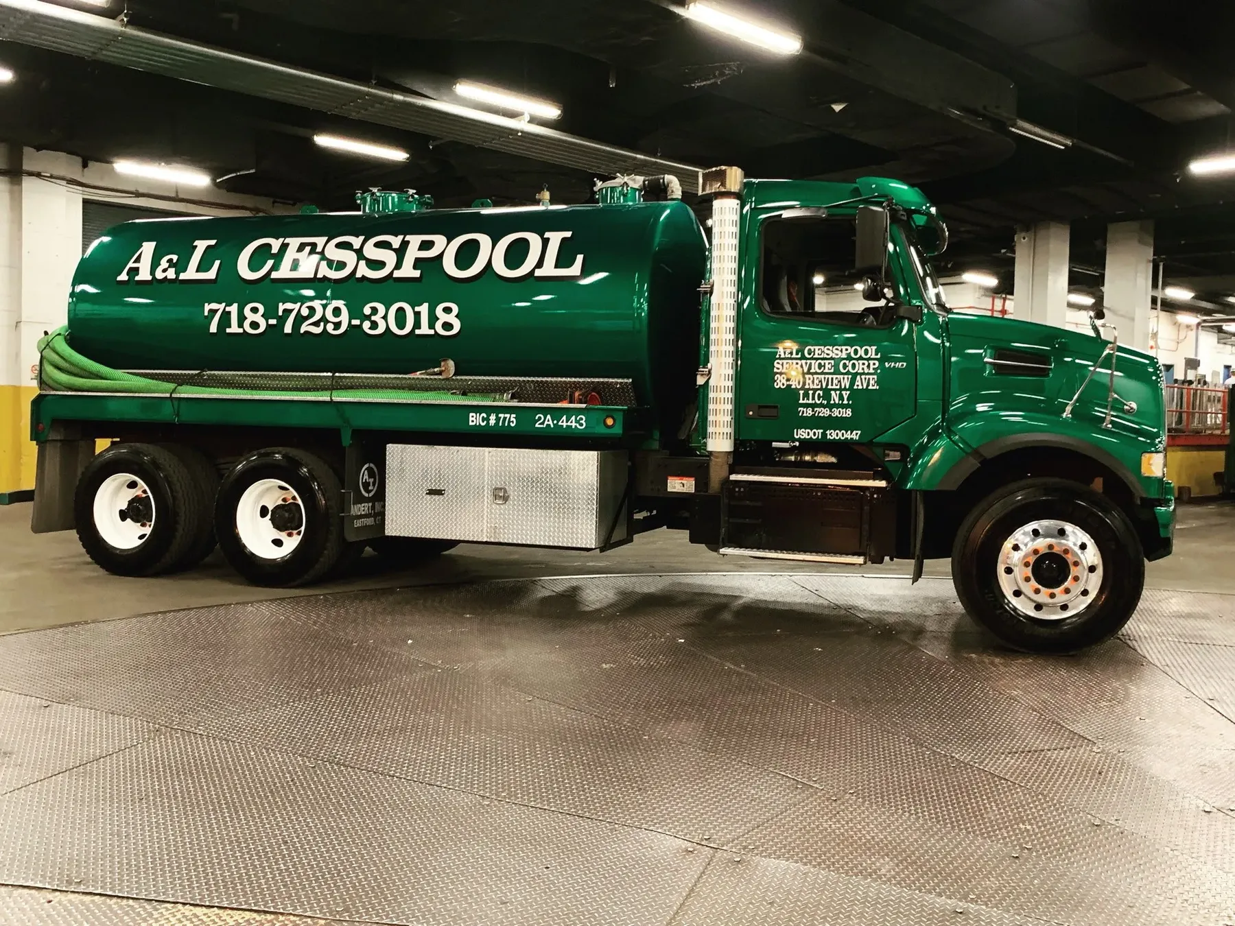 Green A&L Cesspool vacuum tanker in the Long Island City depot